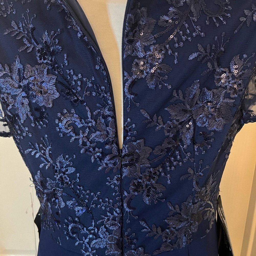 Rae Floral Embroidered Bow Detail A-Line Gown
JS Collections - Picture 8 of 13